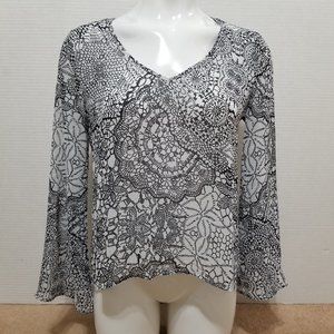 Ambiance top Small semi sheer floral geometric print split back bell sleeve